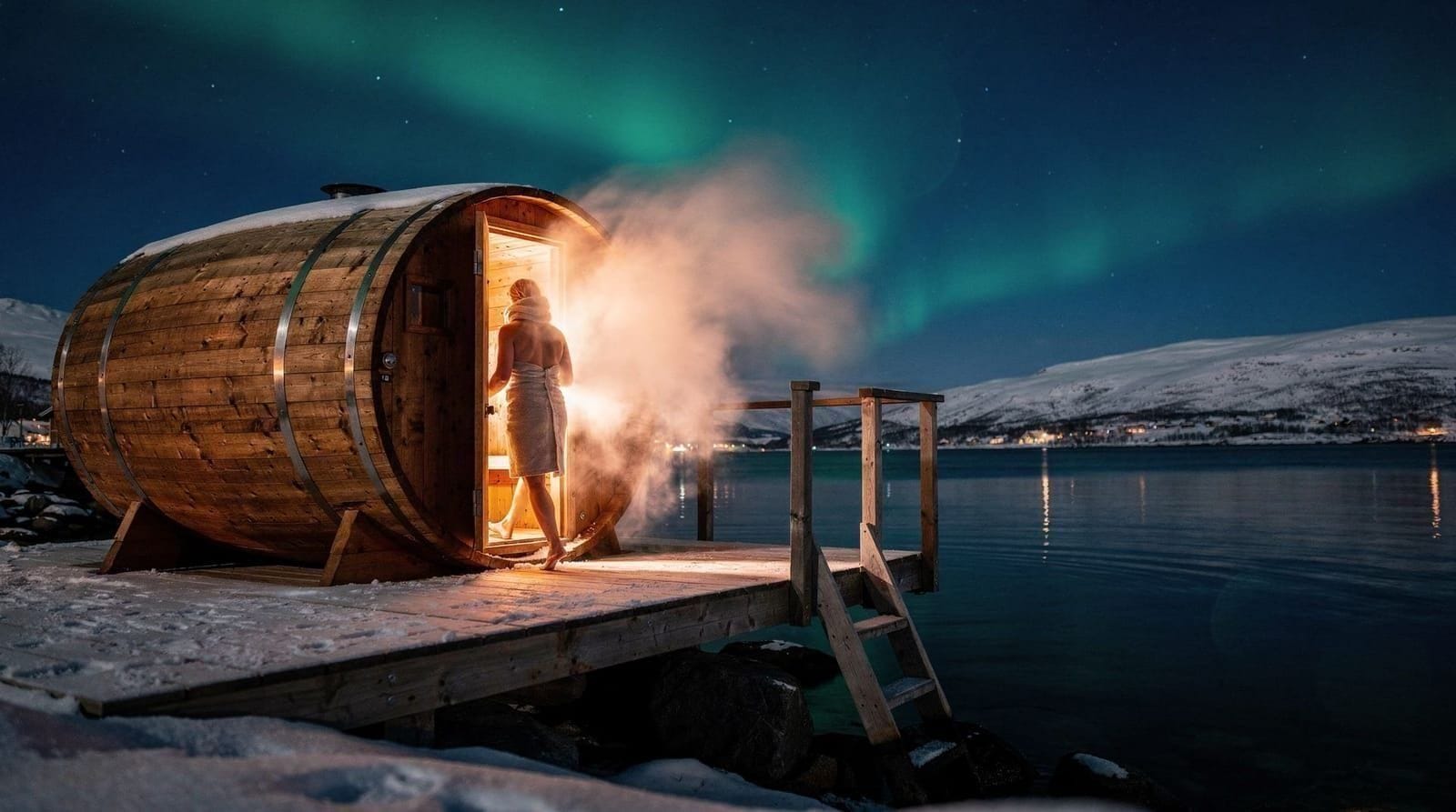 Arctic sauna in Tromsø: what to expect and where to go — Floating saunas, roll-in-the-snow moments, and jumping into a frozen fjord — the