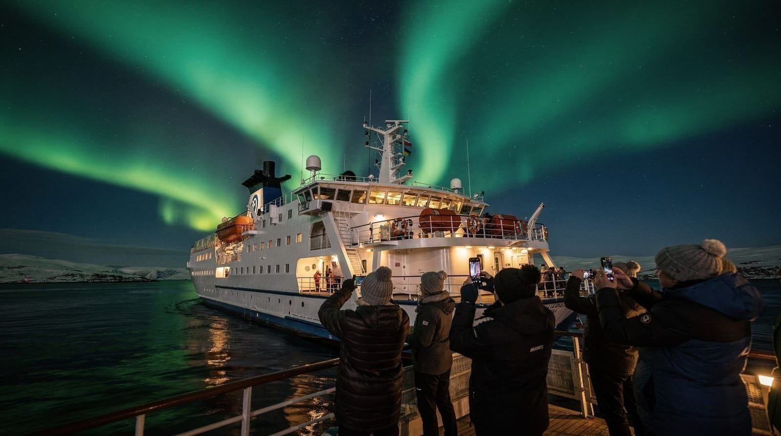 Seeing the northern lights from a cruise ship near Tromsø — Can you see aurora from a cruise ship near Tromsø? What to expect, best fjord vi