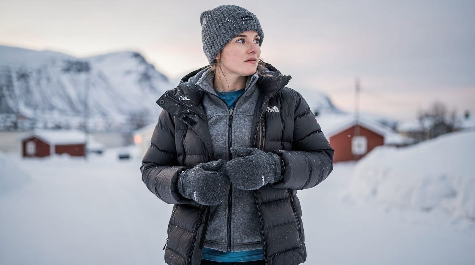 What to wear in Tromsø in winter — the layering system explained — Winter Tromsø (-8 to +2°C) demands a 3-layer system: moisture-wicking base, insu